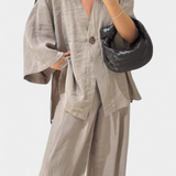 Eli Compleu oversized cu top cu decolteu în V și pantaloni drepți