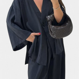 Eli Compleu oversized cu top cu decolteu în V și pantaloni drepți