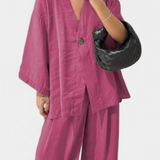 Eli Compleu oversized cu top cu decolteu în V și pantaloni drepți