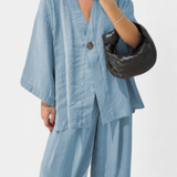 Eli Compleu oversized cu top cu decolteu în V și pantaloni drepți