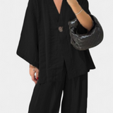 Eli set oversized cu top cu decolteu în V și pantaloni drepți